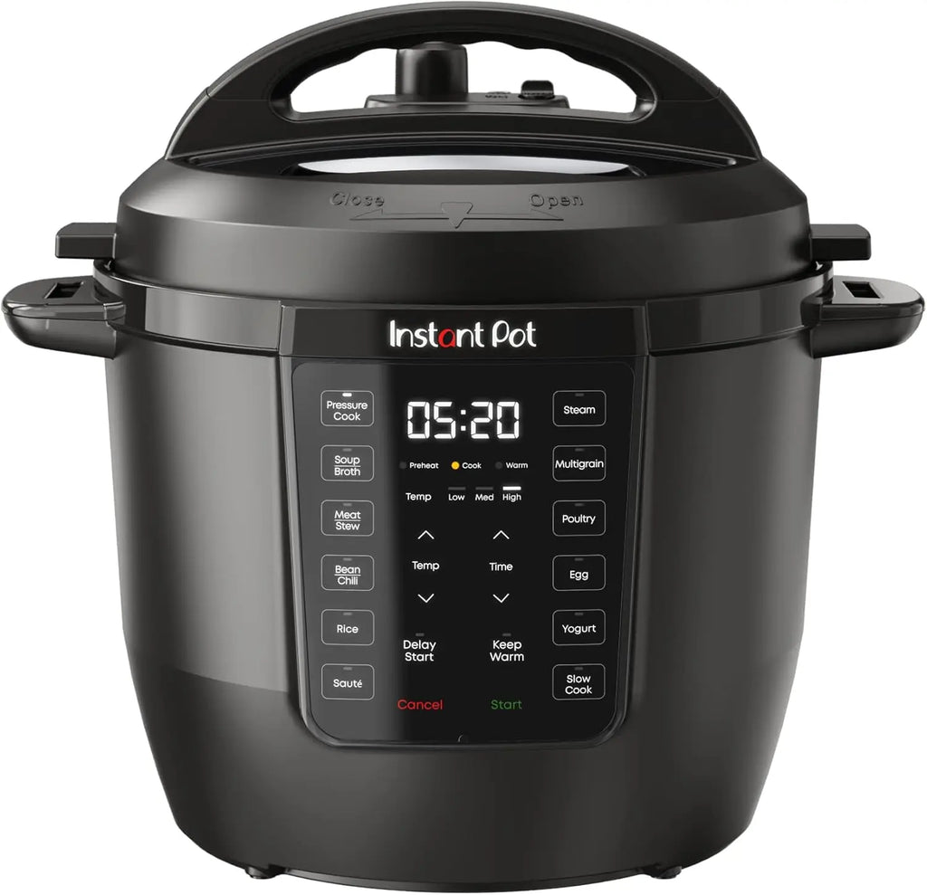 7-in-1 Multi-Cooker 6-Quart Capacity on a kitchen countertop showing various cooking functions.