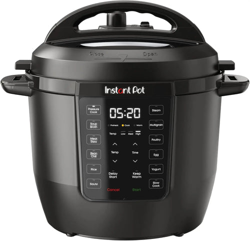 7-in-1 Multi-Cooker 6-Quart Capacity on a kitchen countertop showing various cooking functions.