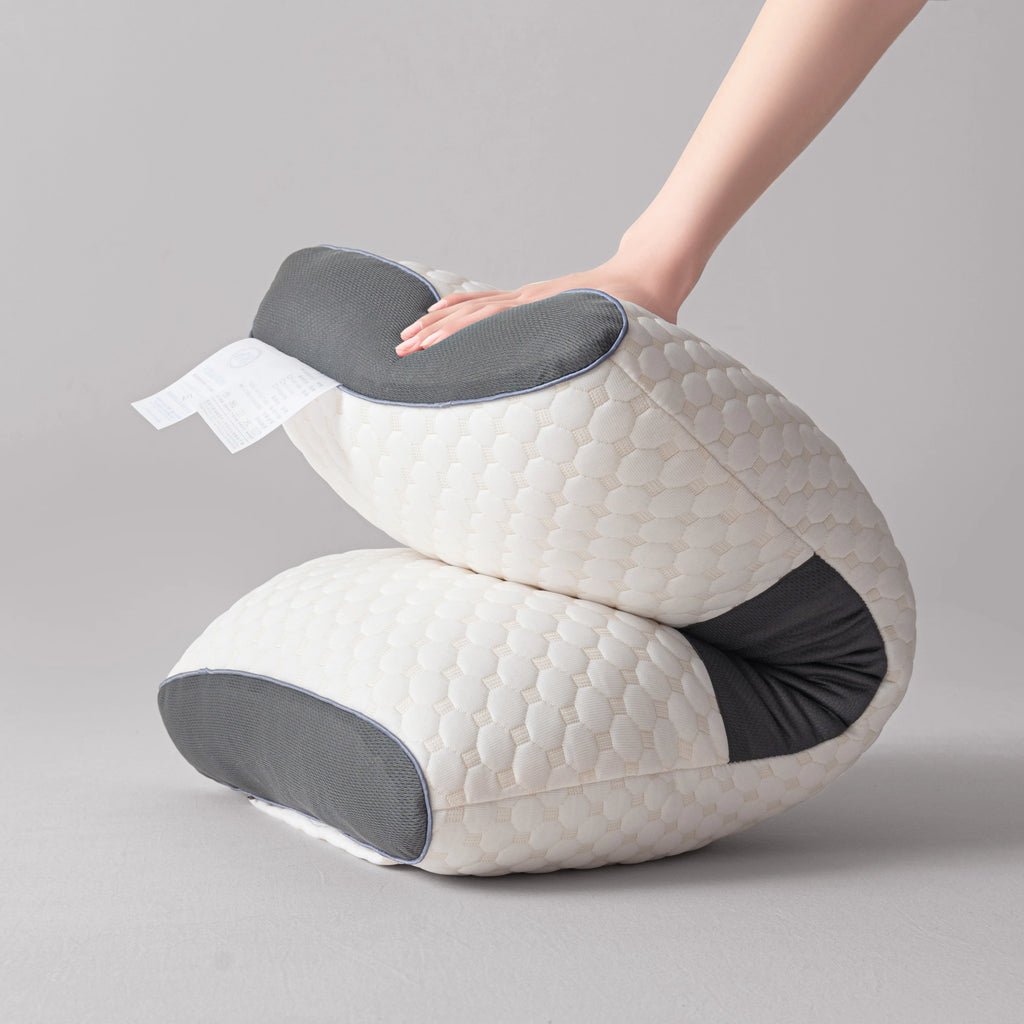 2-Pack Ergonomic Neck Pillows - Lightweight and Breathable for Pain-Free Sleep, highlighting the machine washable feature.